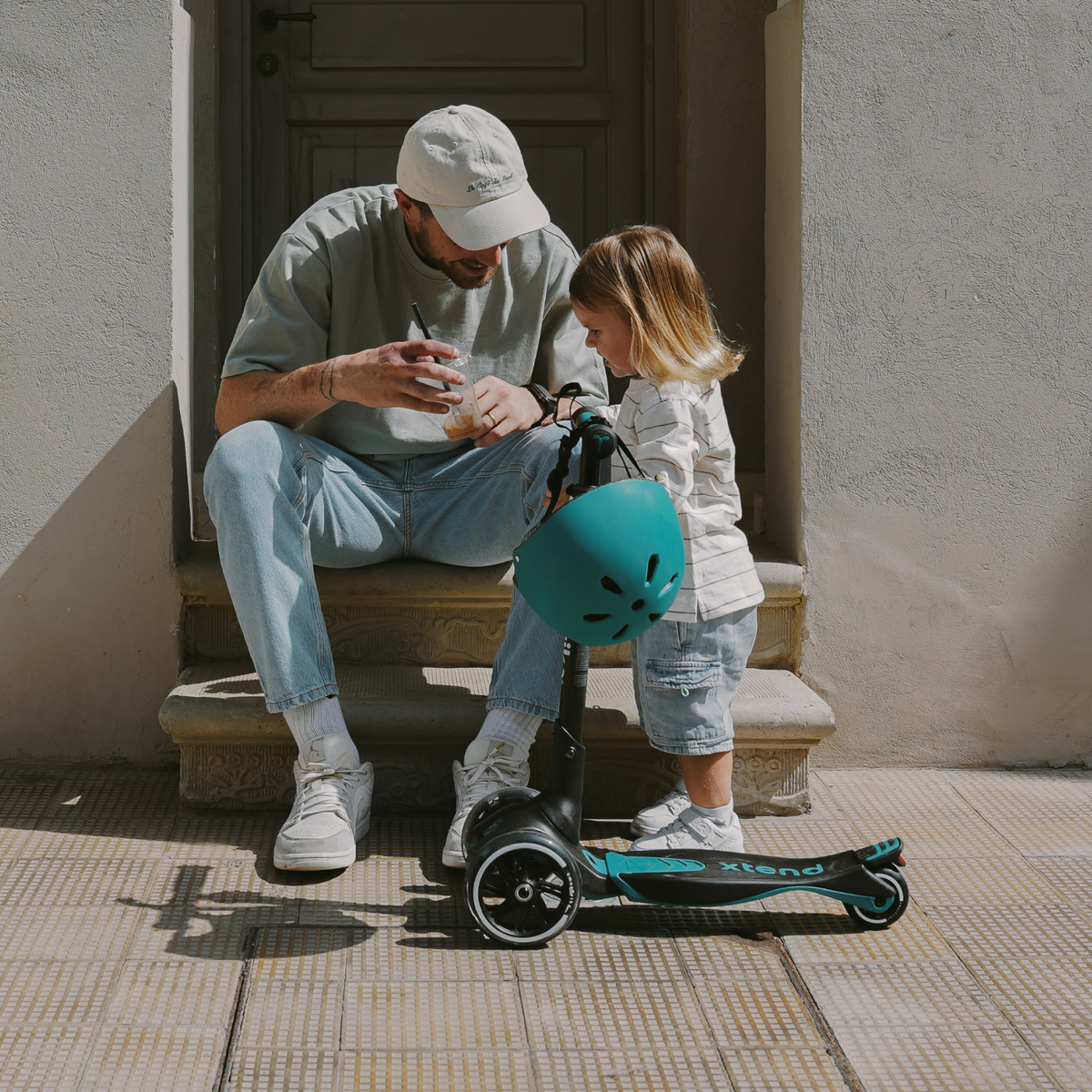 SmarTrike Xtend Ride-on scooter with adjustable handlebar and colorful design, suitable for young children.
