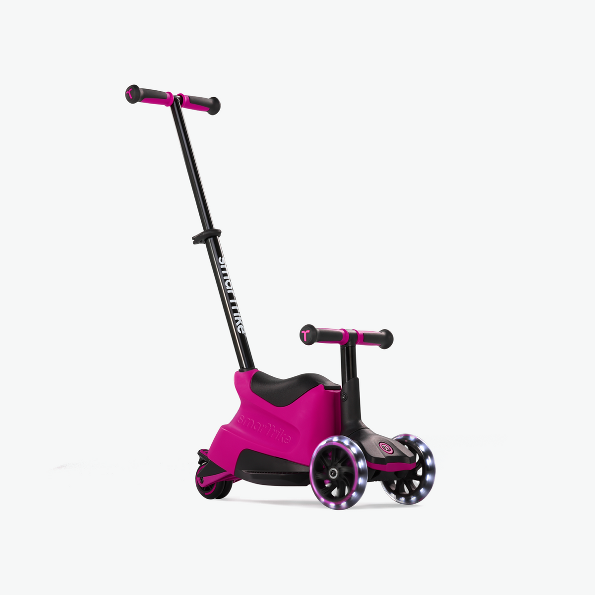 Pink smarTrike Xtend Ride-on scooter shown from the front, featuring a child-friendly design and sturdy handlebar for young riders.