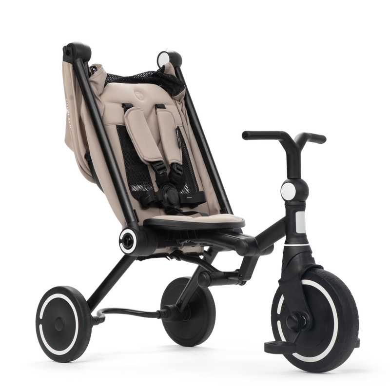 Toddler riding the smarTrike Wonder max independently