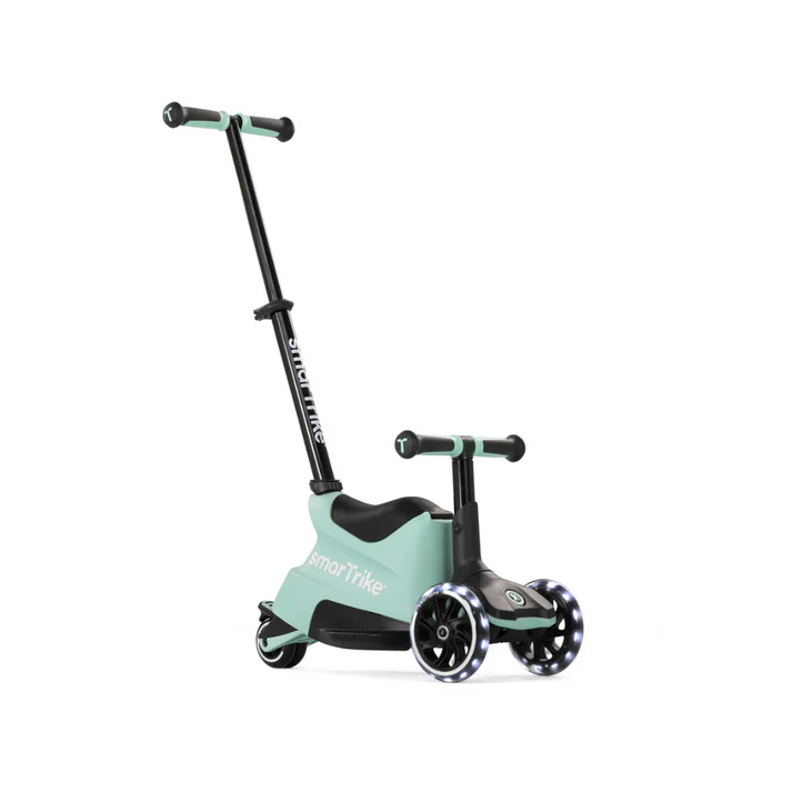 SmarTrike Xtend Ride-on scooter in soft green with adjustable handlebar and sturdy wheels for young children.
